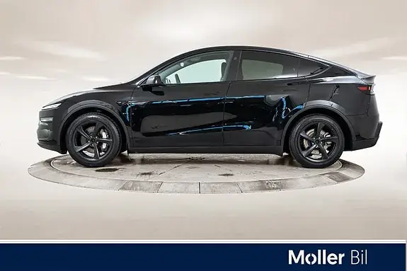 Tesla Model Y 2025 photo 2
