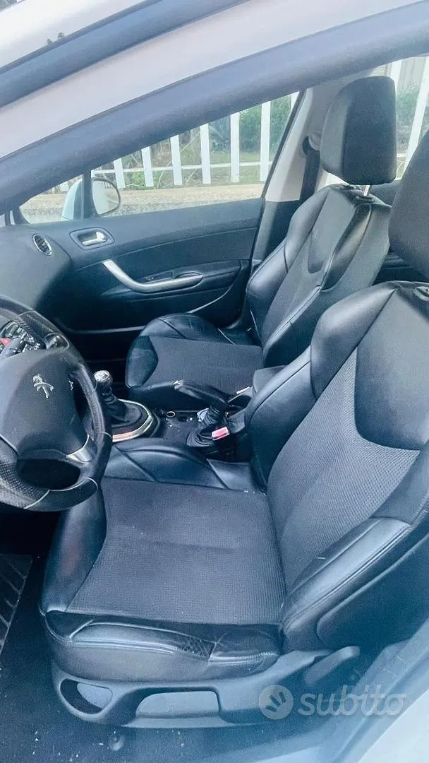 Peugeot 308 2011 photo 5