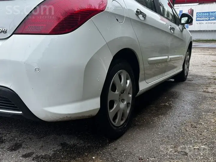 Peugeot 308 2013 photo 5