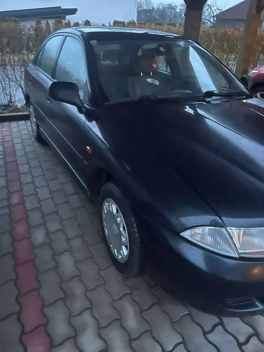 Mitsubishi Carisma 1999 photo 3