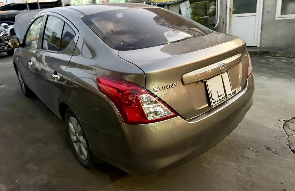 Nissan Sunny 2013 photo 4