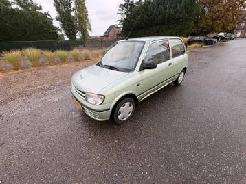 Daihatsu Cuore 1999 photo 3