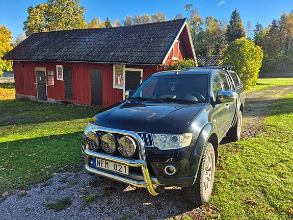 Mitsubishi L200 2013 photo 2