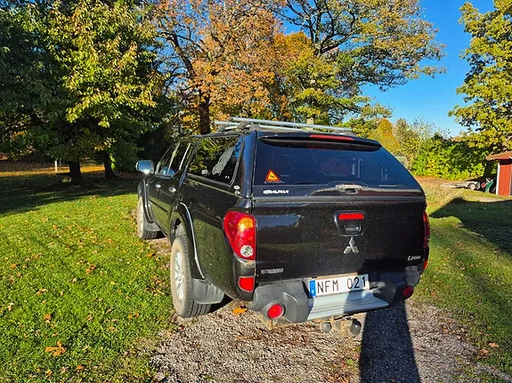 Mitsubishi L200 2013 photo 4