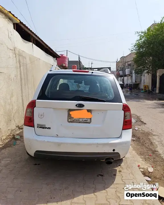 Kia Carens 2012 photo 2