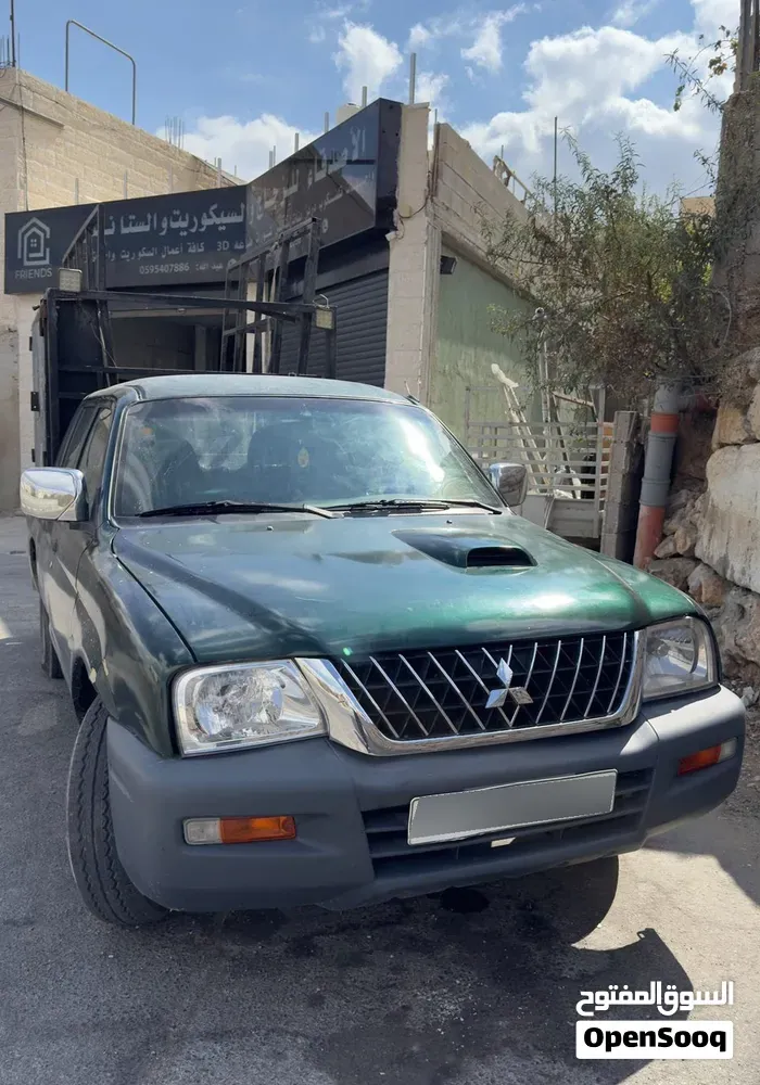 Mitsubishi L200 2005 photo 2