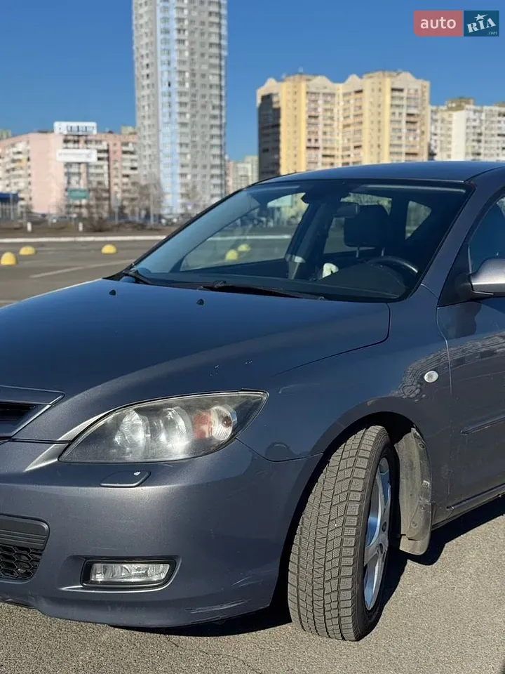 Mazda 3 2009 photo 3