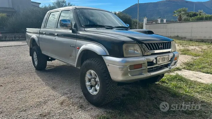 Mitsubishi L200 1998 photo 3