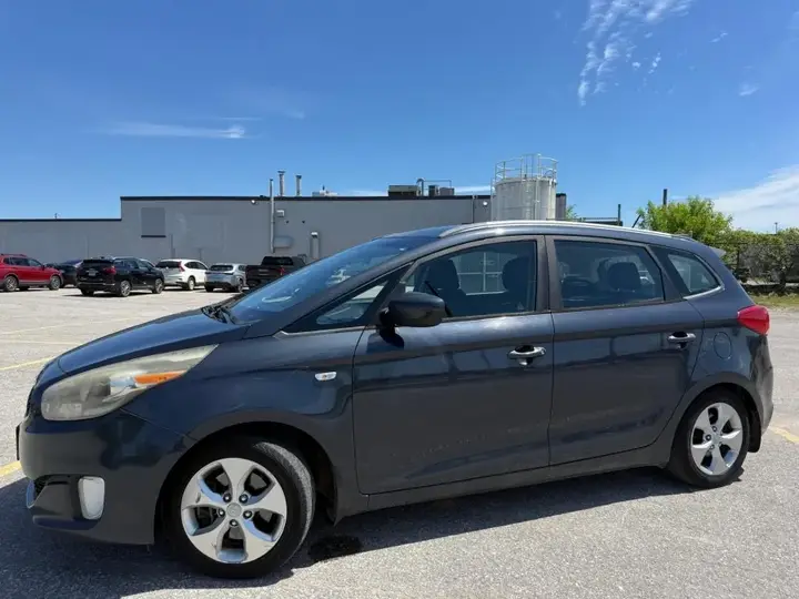 Kia Rondo 2014 photo 3