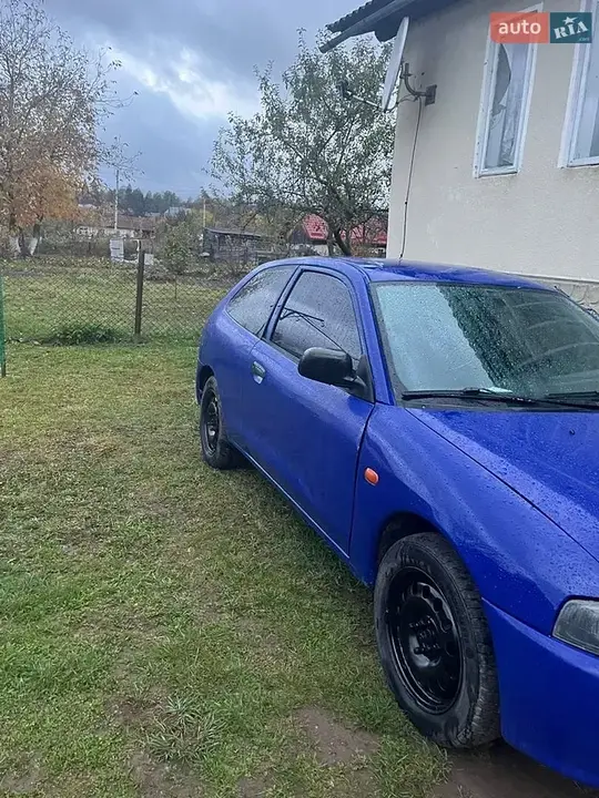 Mitsubishi Colt 1998 photo 2