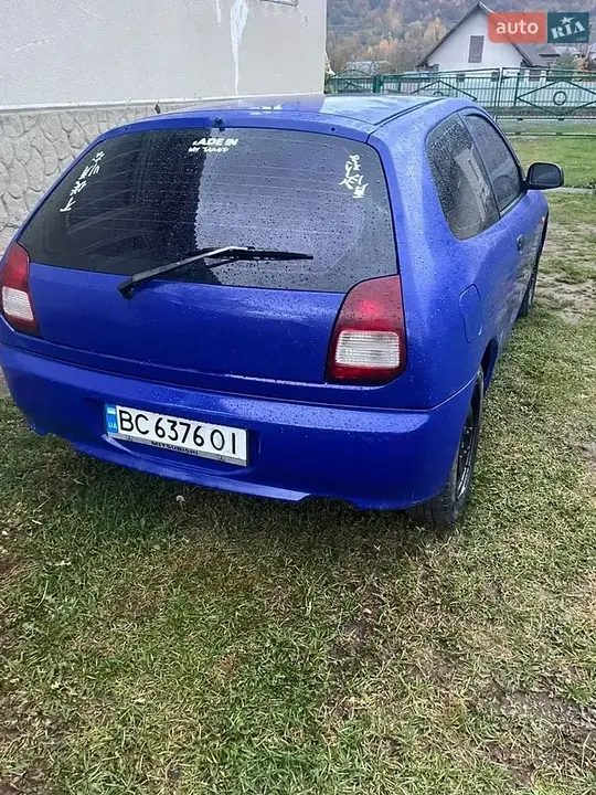 Mitsubishi Colt 1998 photo 4