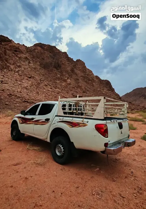 Mitsubishi L200 2011 photo 4