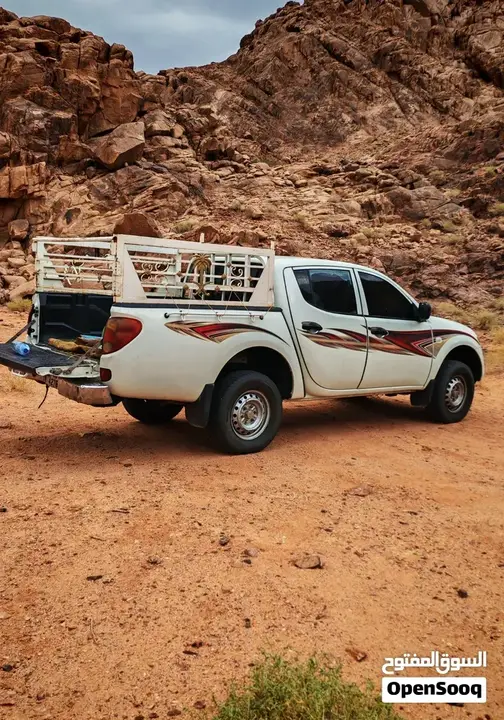 Mitsubishi L200 2011 photo 3