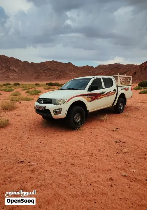 Mitsubishi L200 2011 photo 2
