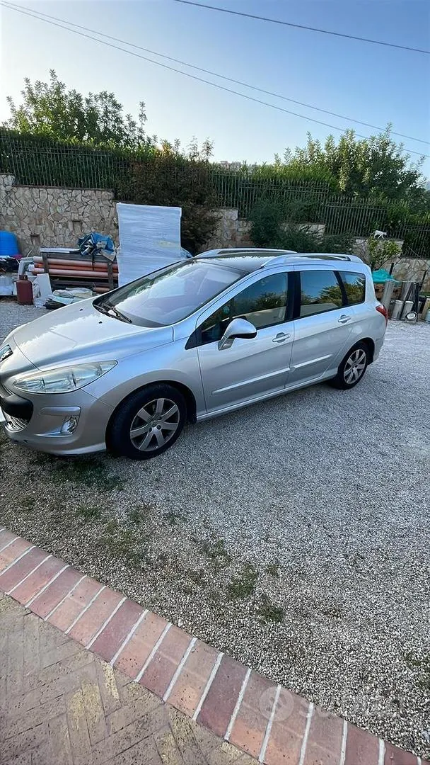 Peugeot 308 2009 photo 2