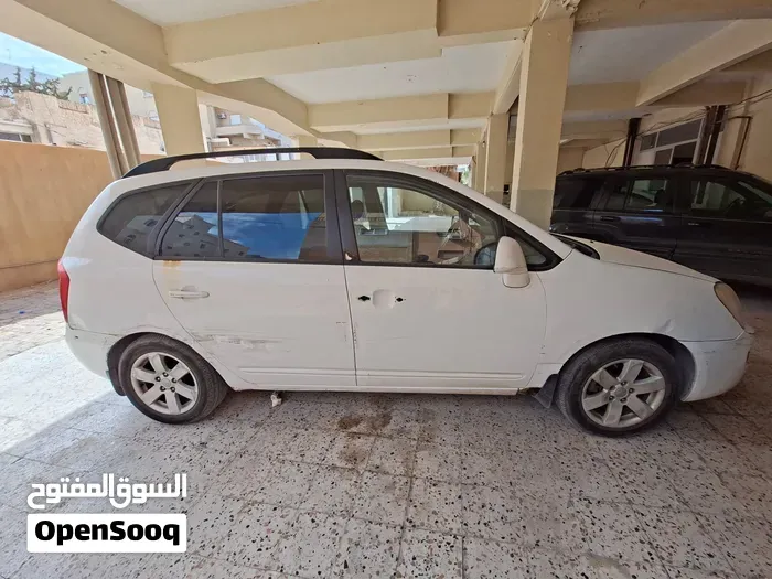 Kia Carens 2009 photo 2
