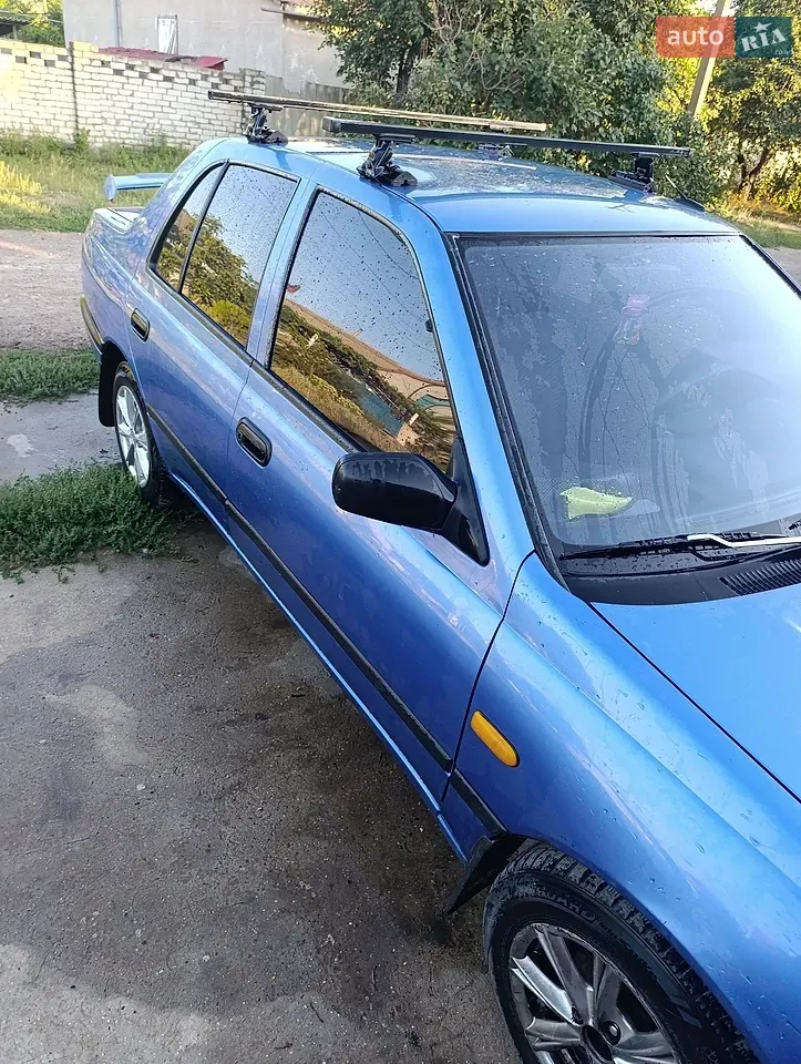 Nissan Sunny 1995 photo 2