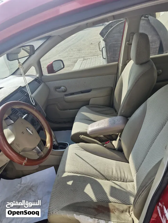 Nissan Tiida 2010 photo 4