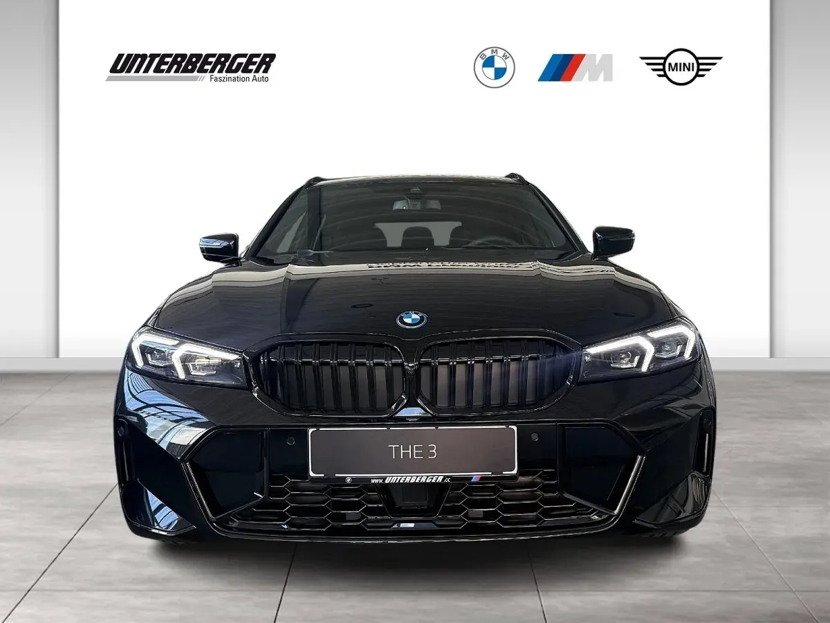 BMW 3 Series photo 2