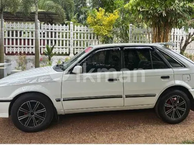 Mazda 3 1987 photo 2