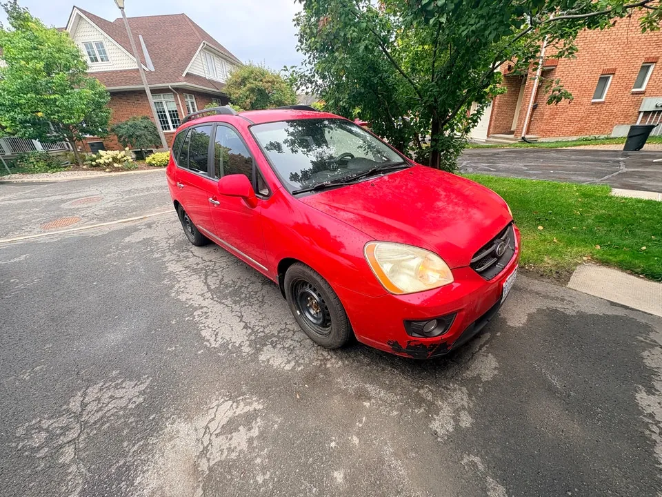 Kia Rondo 2009 photo 4