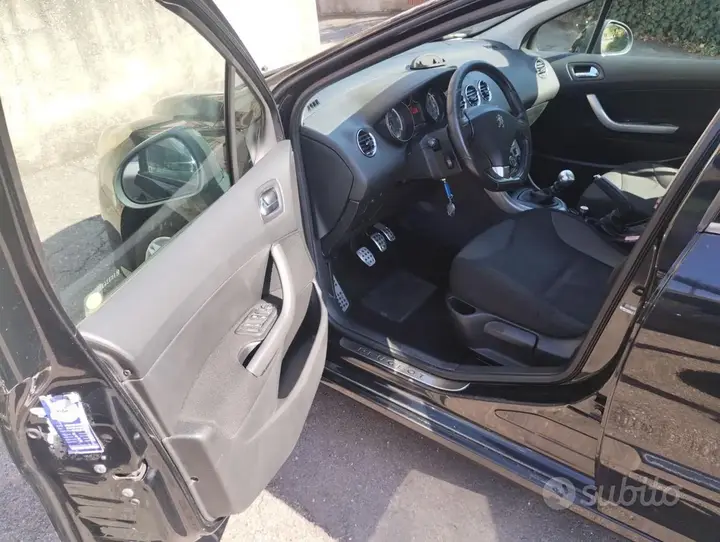 Peugeot 308 2012 photo 3