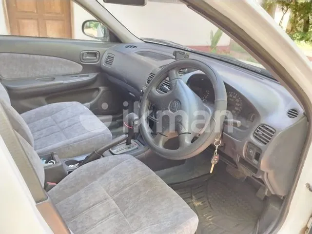 Nissan Y11 2000 photo 5