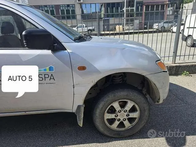 Mitsubishi L200 2010 photo 4