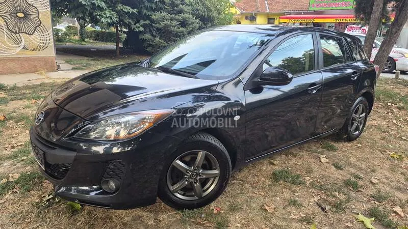 Mazda 3 2013 photo 3