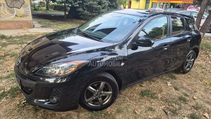 Mazda 3 2013 photo 2