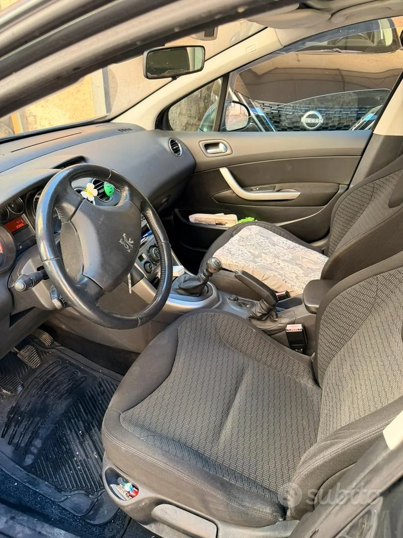 Peugeot 308 2010 photo 2