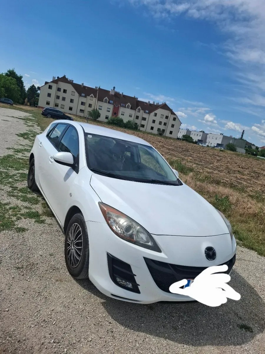 Mazda 323 2009 photo 3