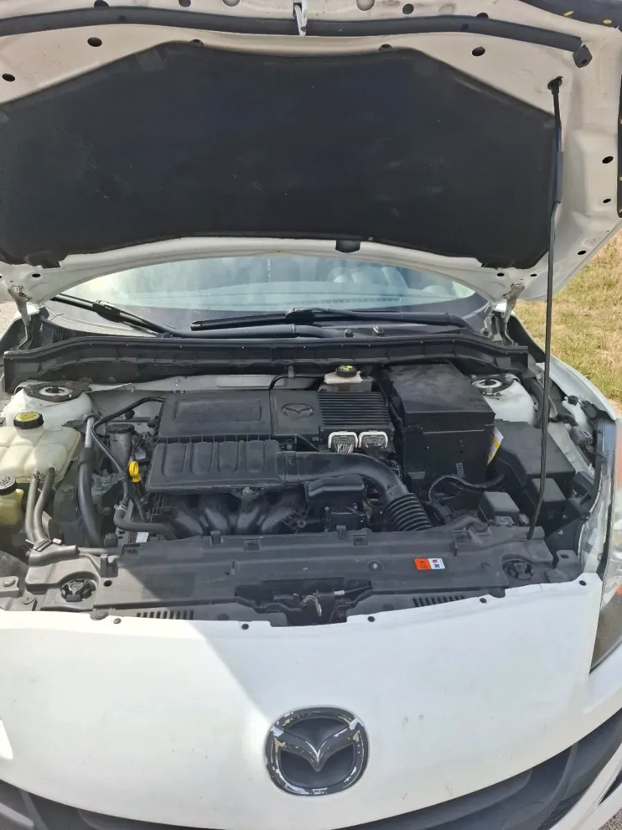 Mazda 323 2009 photo 2