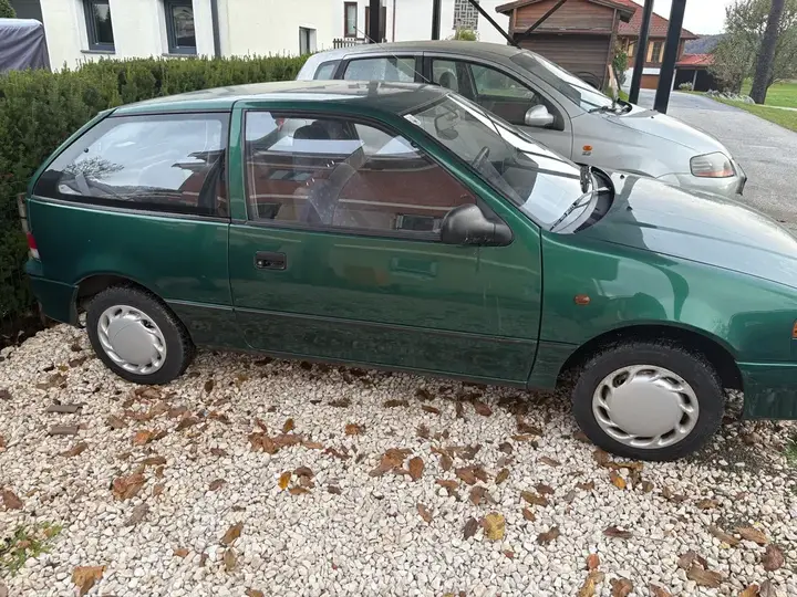 Suzuki Swift 1997 photo 2