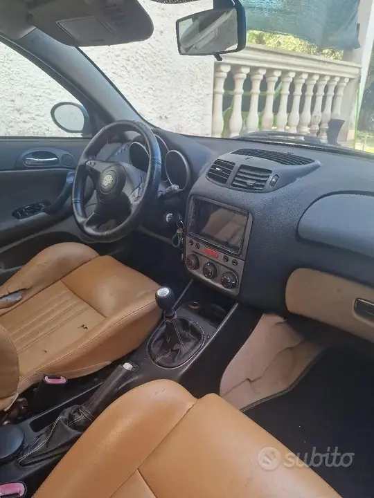 Alfa Romeo 147 2004 photo 2