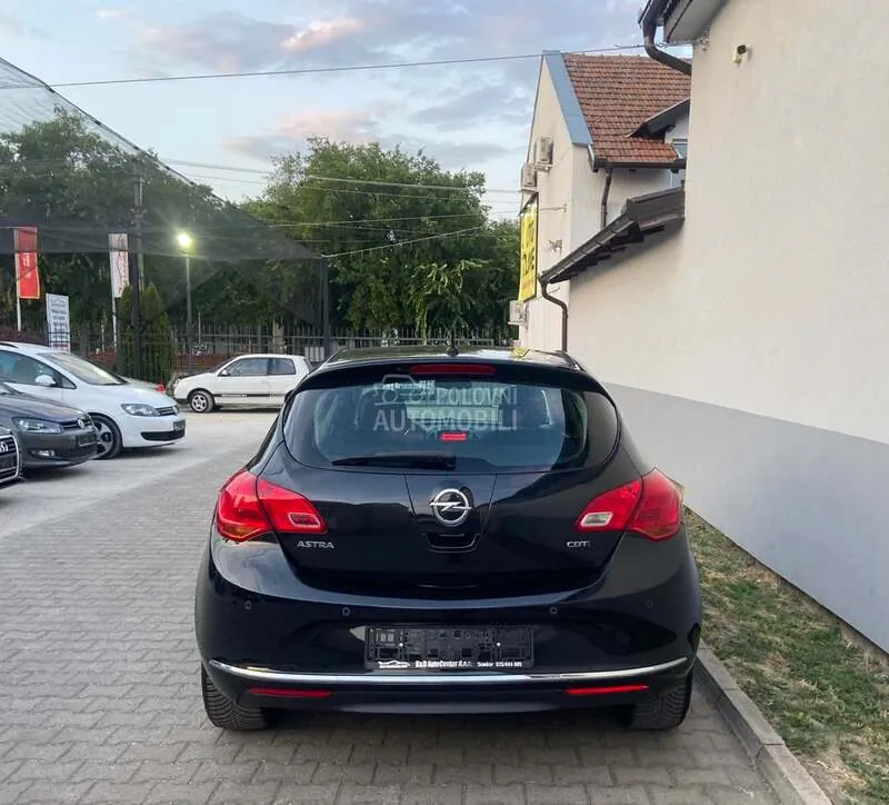 Opel Astra J 2013 photo 5