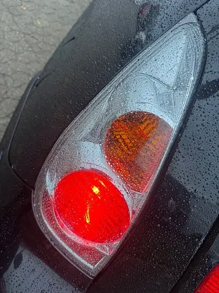 Suzuki Liana 2005 photo 2