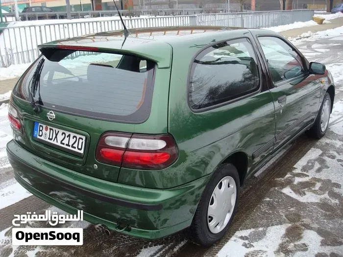 Nissan Almera 1998 photo 3