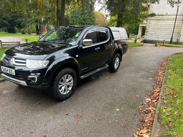 Mitsubishi L200 2014 photo 4