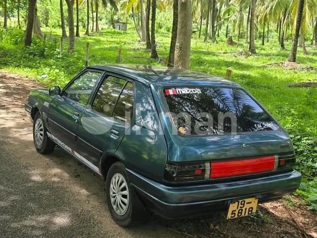 Mazda Familia 1995 photo 2