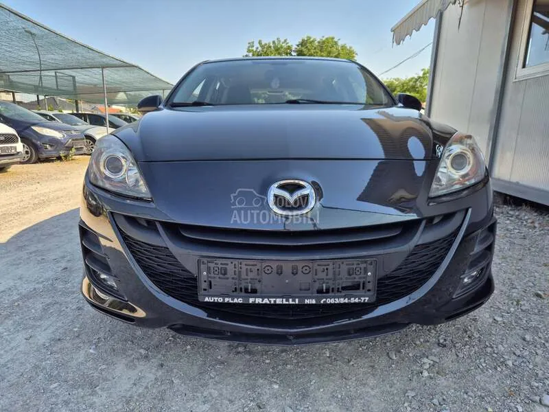 Mazda 3 2010 photo 4