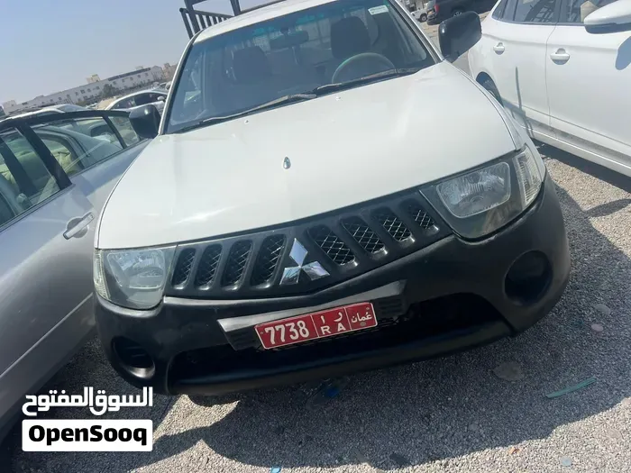 Mitsubishi L200 2009 photo 2