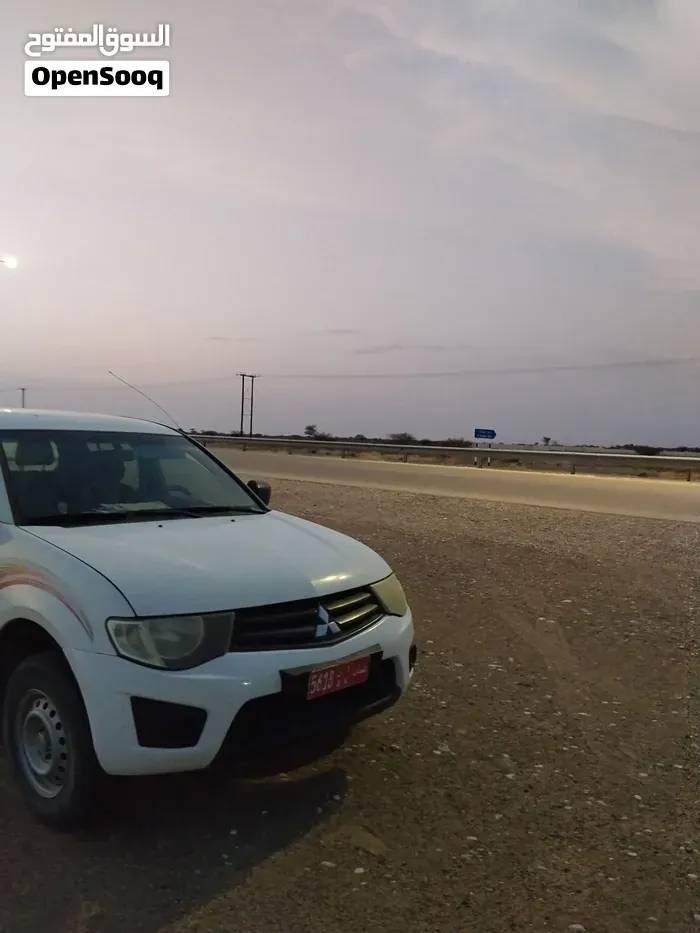 Mitsubishi L200 2009 photo 4