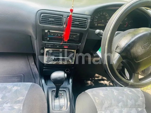 Nissan Wingroad 1998 photo 4