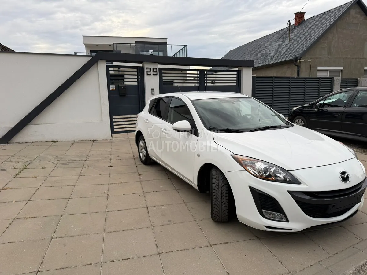 Mazda 3 2011 photo 4