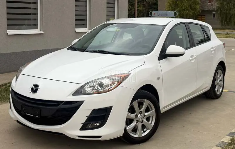 Mazda 3 2010 photo 4