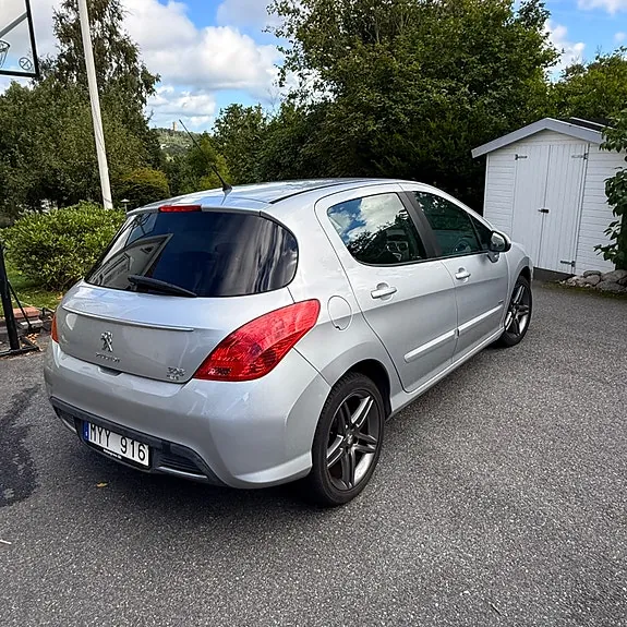 Peugeot 308 2012 photo 2