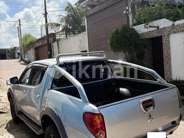 Mitsubishi L200 2007 photo 4