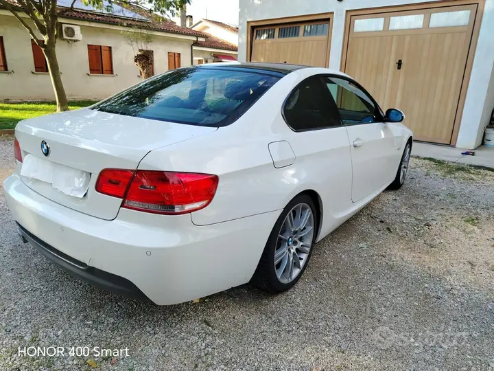BMW 320D 2009 photo 4
