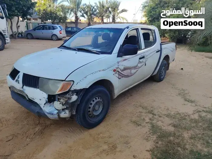 Mitsubishi L200 2004 photo 2